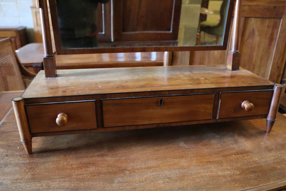 A Regency mahogany five drawer bowfront chest, width 91cm and a mahogany toilet mirror, width 67cm